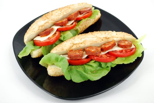 Sandwich with sausage and salad