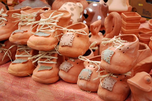 Decorative brown ceramic shoes souvenir