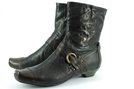 Woman elegance leather boots on white