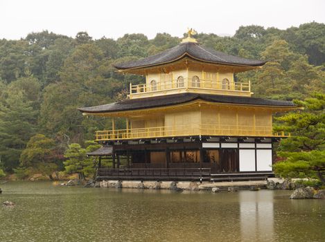 Falling rain in Rainy day at Kinkakuji Temple or The Golden Pavilion temple, Kyoto, Japan
