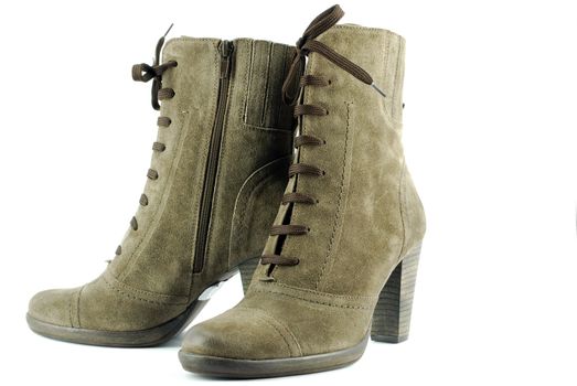 Woman elegance modern boots on white