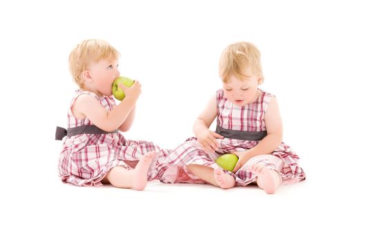 picture of two adorable twins over white