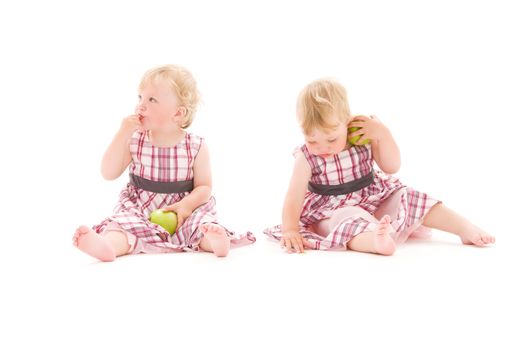 picture of two adorable twins over white