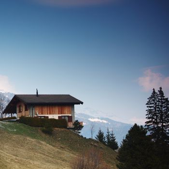 chalet in alpine mountains