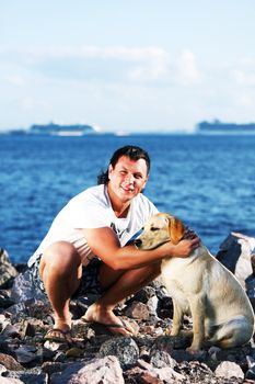 man and dog blue sky on background