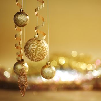 golden christmas balls on bokeh background