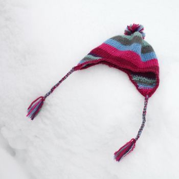 hat on snow close up