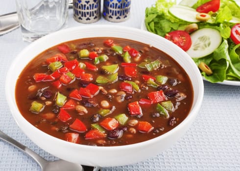Vegetable and bean soup with mixed salad.