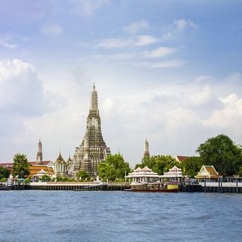 Wat Arun, the Temple of the Dawn, from the Chao Phraya River, Bangkok, Thailand,