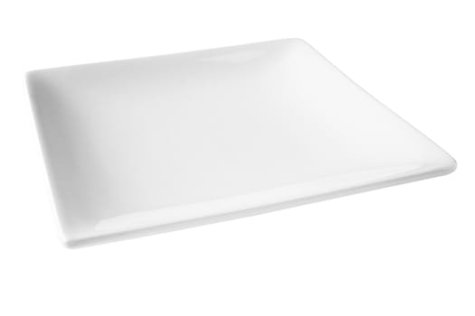 Square white porcelain plate, set at an angle, isloated on white and with clipping path included.