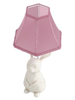 Ceramic bunny rabbit lamp with a pretty checked hexagonal shade isolated on white