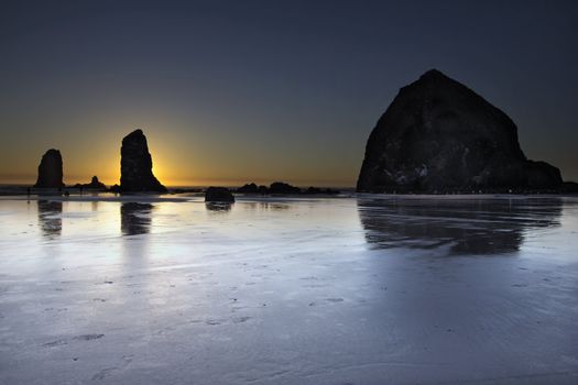 Haystack Rocks and the Needles at Cannon Beach Oregon Coast at Low Tide During Sunset