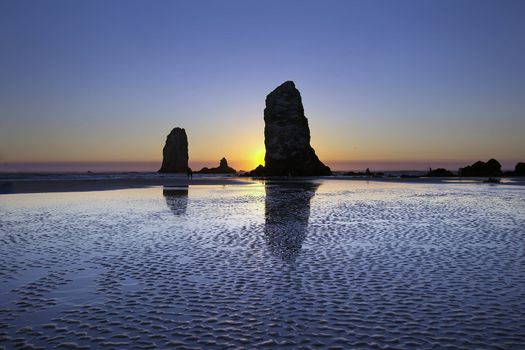 Haystack Needles Rocks at Cannon Beach Oregon Coast during Low Tide at Sunset