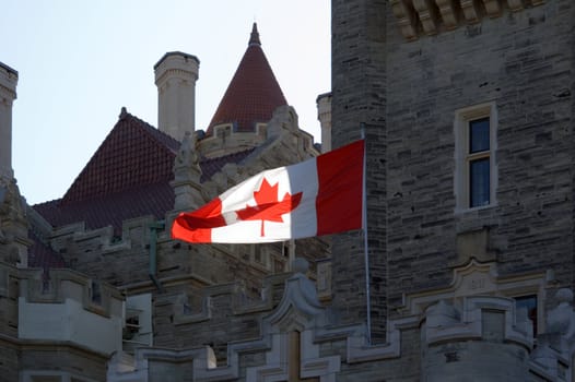 Canadian flag on castle towers background 