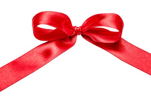 Shiny red satin ribbon on white background