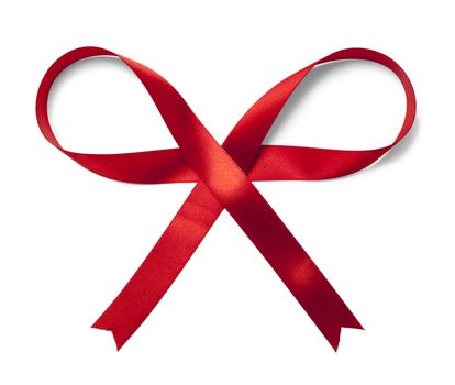 Shiny red satin ribbon on white background