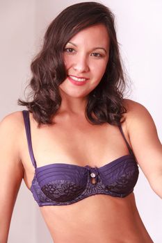 Portrait of a young Monglin with purple bra