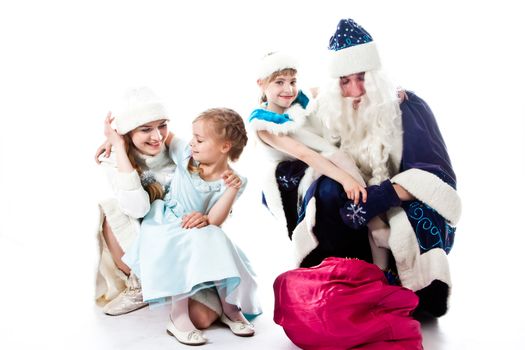 Santa Claus, a granddaughter and a beautiful little girl