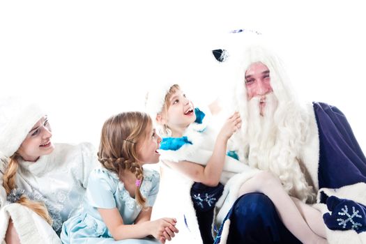 Santa Claus, a granddaughter and a beautiful little girl