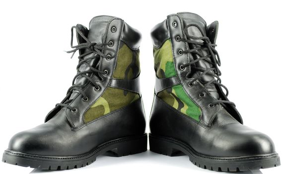 Military combat boots on white