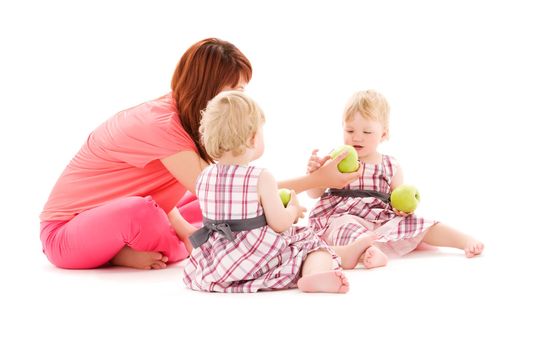 picture of two adorable twins with mother over white