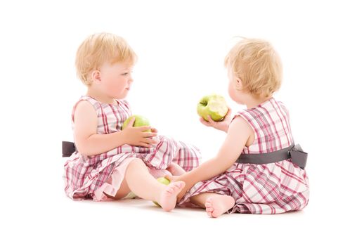 picture of two adorable twins over white