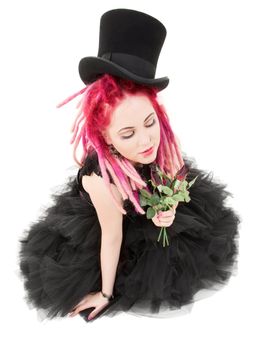 picture of bizarre pink hair girl with top hat and roses