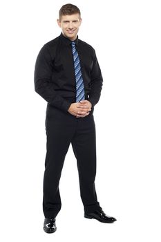 Handsome portrait of young business entrepreneur isolated over white