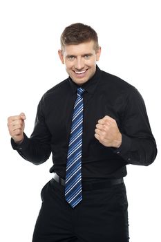 Excited young young entrepreneur expressing his success