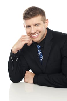 Cheerful corporate executive posing. Isolated on white