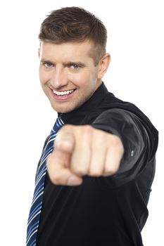 Joyous business consultant pointing at you isolated against white