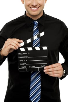 Cropped image of man with clapboard. Isolated on white