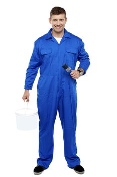 Professional smiling painter isolated over white background
