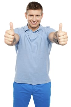 Joyous caucasian male showing double thumbs up isolated against white background