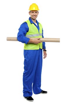 Smiling young architect holding blueprints isolated against white background