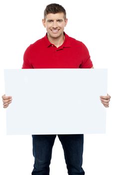 Casual guy presenting ad board. Advertise your business here