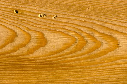 Background of wooden building wall plank closeup details fragment.