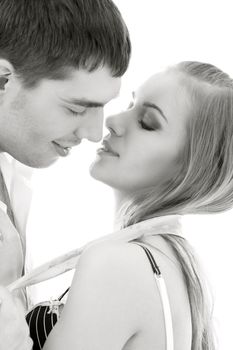 monochrome picture of couple in love over white (focus on woman)