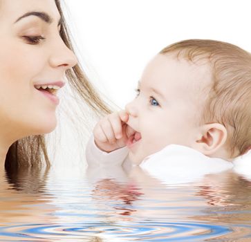 picture of happy mother with baby in water