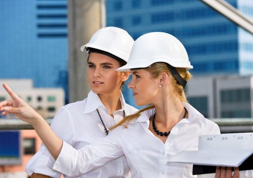 contractors in a front of building site