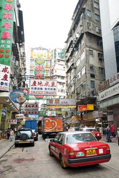 hong kong city center street with taxi