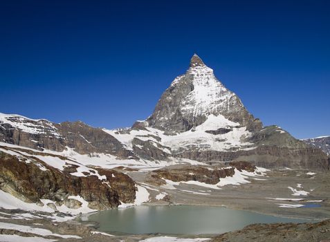 Matterhorn and a cute lake in sunny day