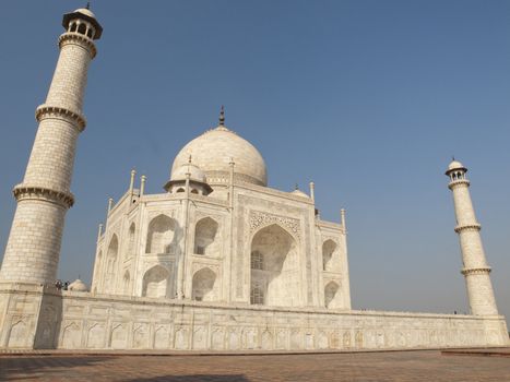 Beautiful white marble of the Taj Mahal seen from east side