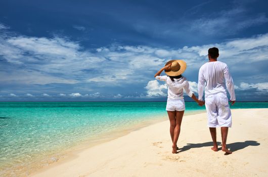 Couple on a tropical beach at Maldives