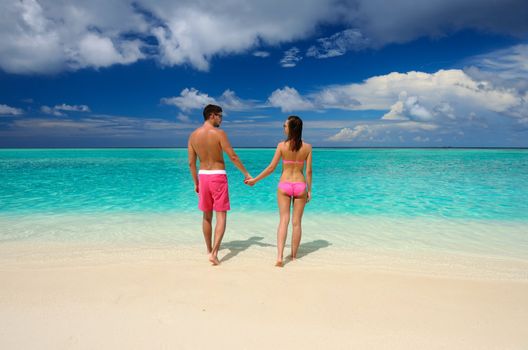 Couple on a tropical beach at Maldives