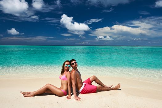 Couple on a tropical beach at Maldives