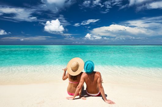 Couple on a tropical beach at Maldives