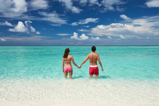 Couple on a tropical beach at Maldives