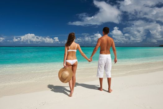 Couple on a tropical beach at Maldives