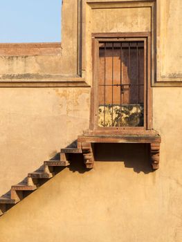 Stairway to locked sandstone door